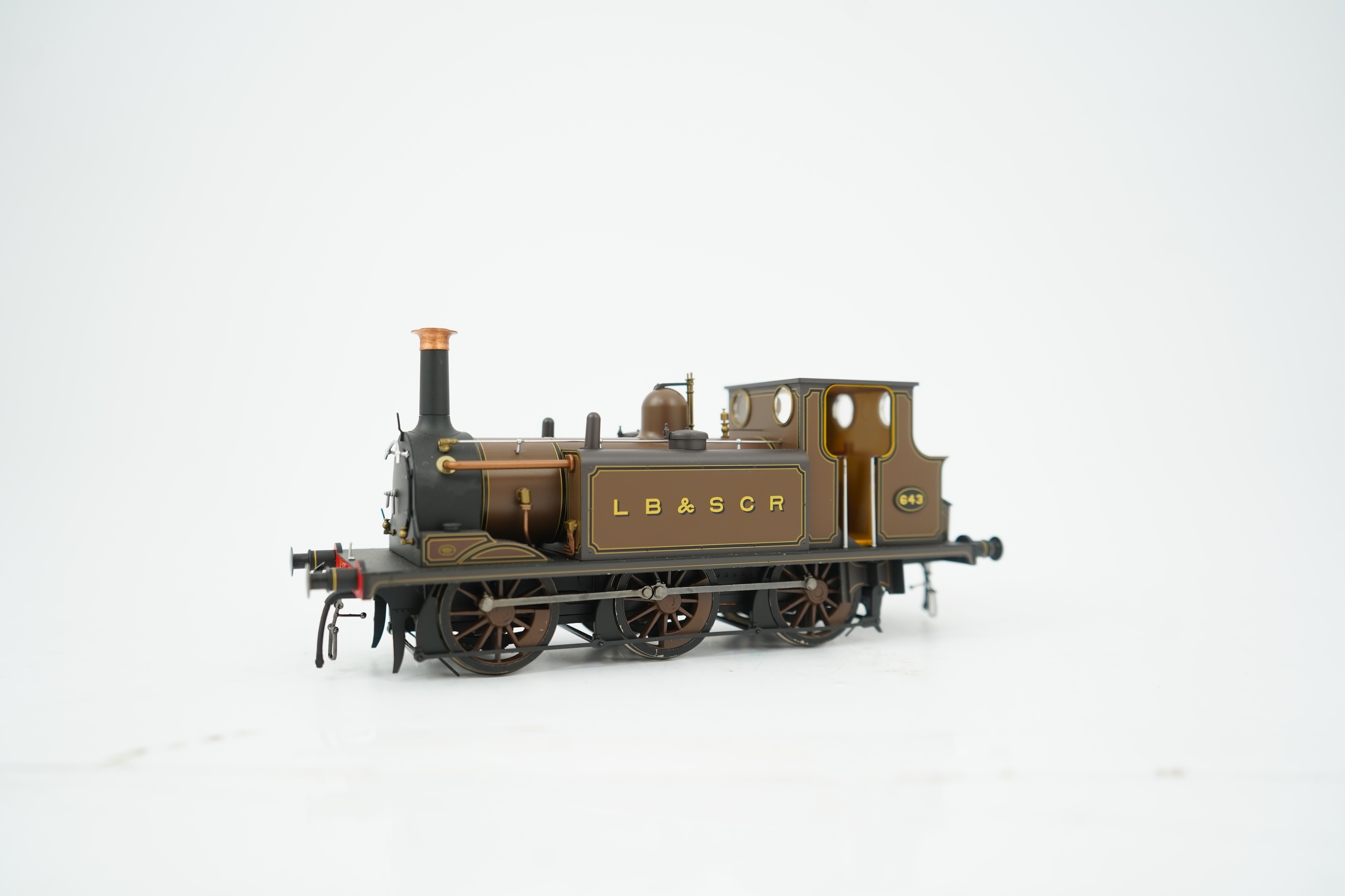 An 0 gauge Dapol model of LB&SCR Class A1, 643, 0-6-0T ‘terrier’ locomotive, powered for two rail operation, with original box and maintenance sheet.